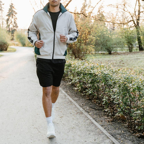 Fit man walking outdoors