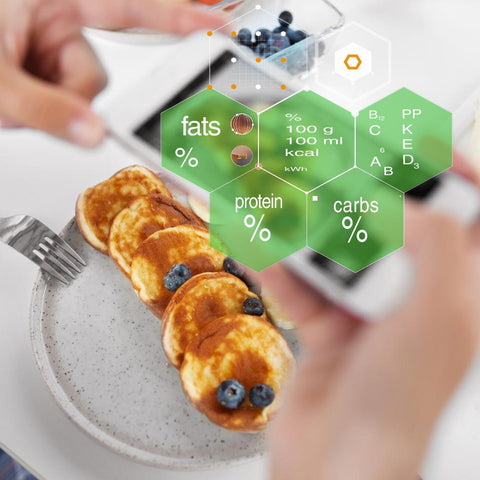 Person measuring the carbs and nutritional value of their breakfast