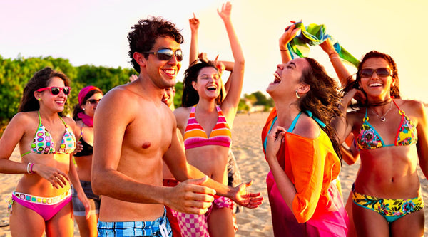 group of friends enjoying the sun and sea together