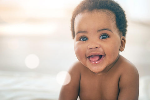 Baby smiling with soft baby skin