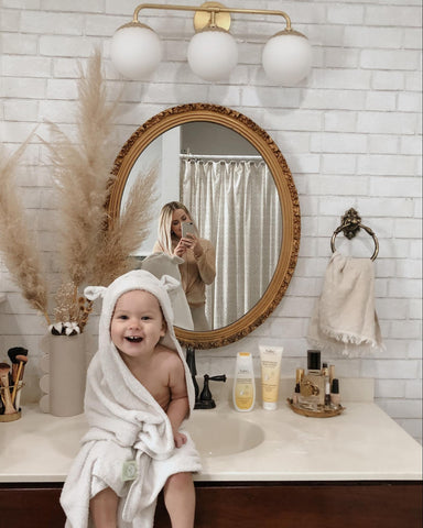 Happy baby after taking a bath with colloidal oatmeal