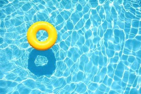 Pool with yellow floating inner tube