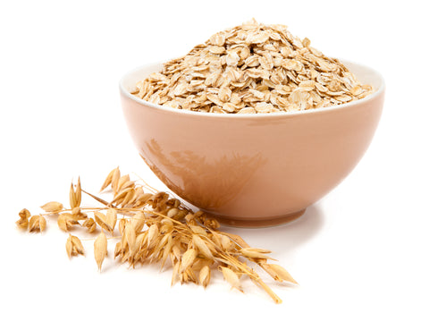 Bowl of dry oatmeal for an oatmeal bath