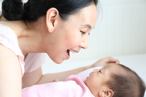 mom talking to baby 