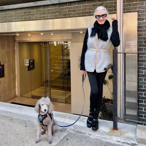 Linda Rodin style icon of @lindaandwinks with her dog winks in Manhattan NYC wearing stylish reflective mohair vest by Vespertine NYC