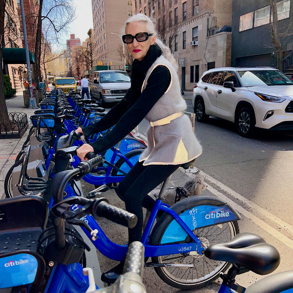 Linda Rodin of @lindaandwinks on a citibike @citibike wearing a gorgeous mohair reflective vest