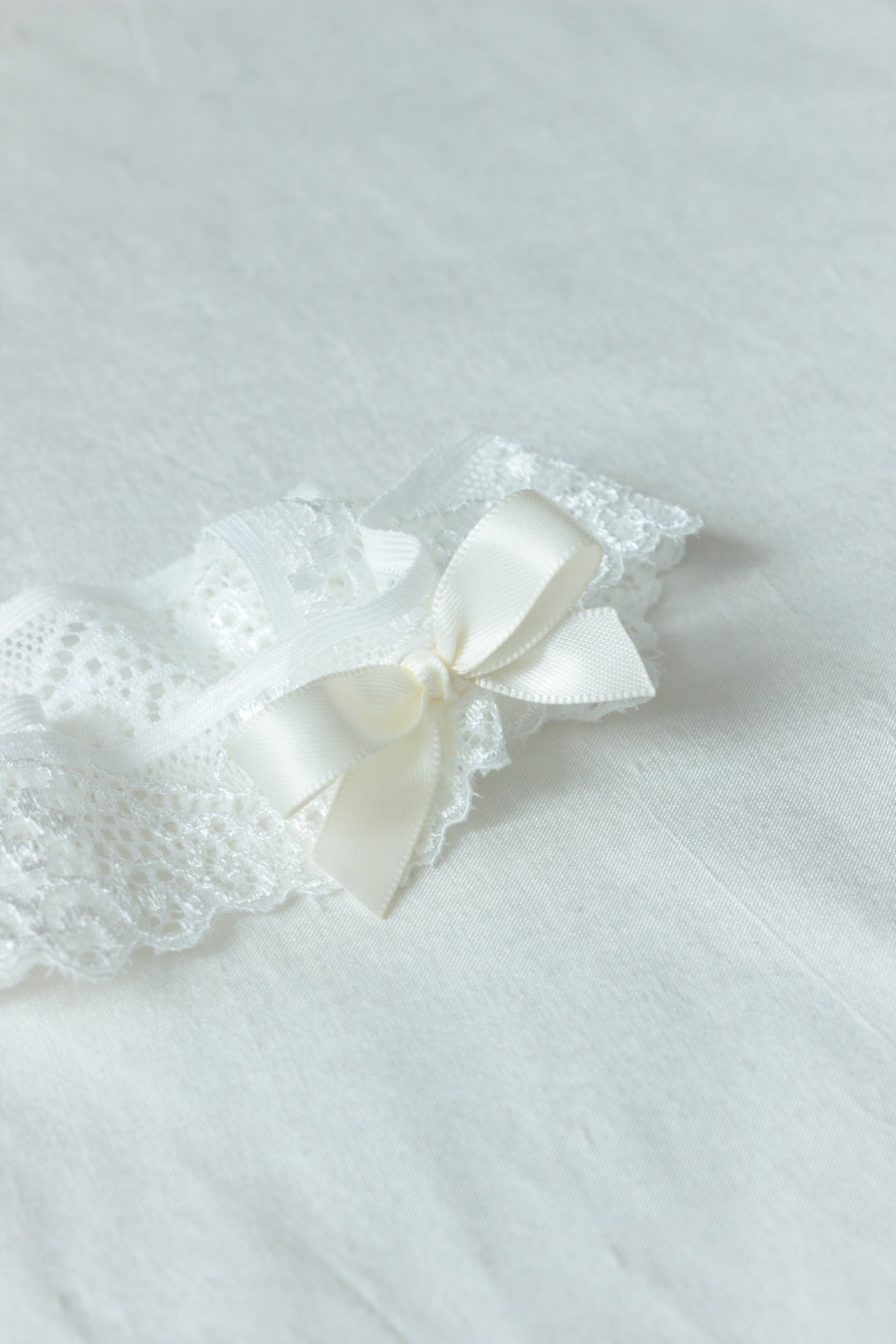 Emma Simple Light Ivory Lace Wedding Garter Set With Blue Bow