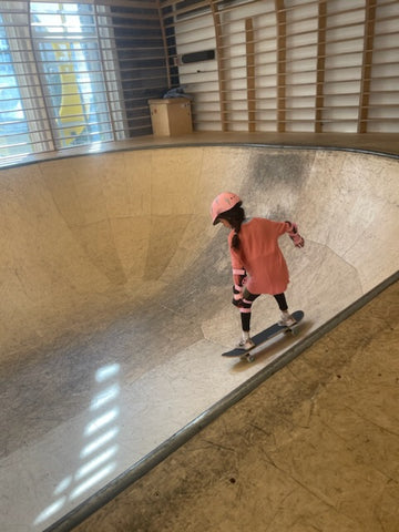 A girl skateboarding at Selfridges London