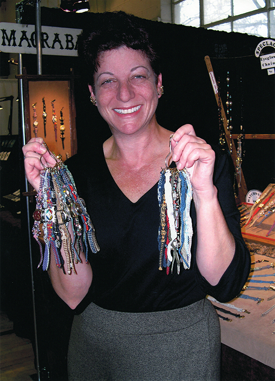 Longtime customer Beverly holding her personal cache of Macrabands!