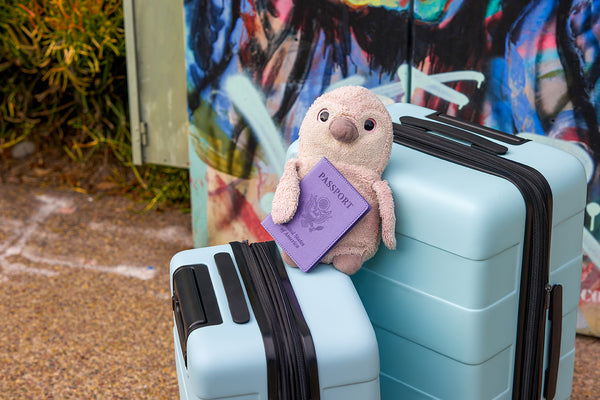 A soft toy like Penguin can make traveling less stressful.