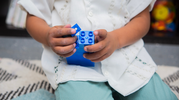 Child playing with a fidget toy