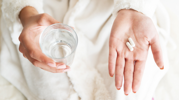 Probiotic capsules in hand