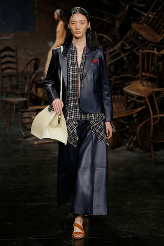 the-brita-blazer-in-navy-leather,the-selma-pant-in-navy-leather,the-braided-sandal-in-cognac