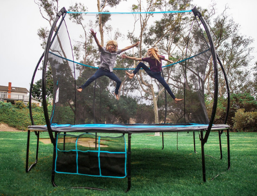 kids jumping on trampoline