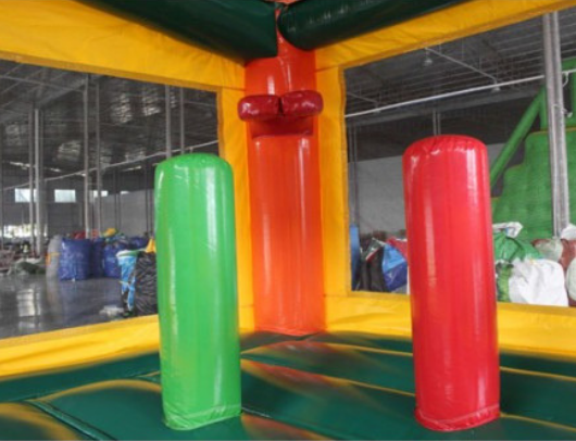 palm tree commercial bouncy house with inflatable basketball hoop and pop up obstacles