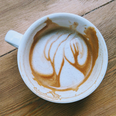 Bird's Eye image of a cappuccino with foam art looking like trees