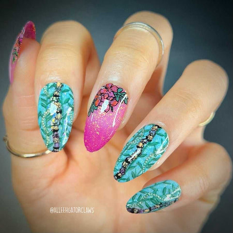 Hawaiian manicure for summer with garlands of Hawaiian lei and tropical flowers.