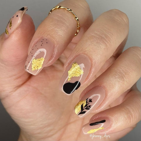 Natural looking abstract nails with gold accent
