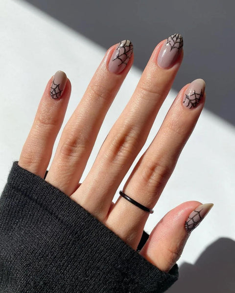 a hand with spider webs for nail art accent nail stickers nails nails ghost nail art nail designs nails halloween nails