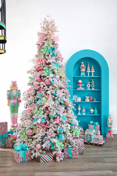 a pink and blue decorated christmas tree merry Christmas eternal life copper accents