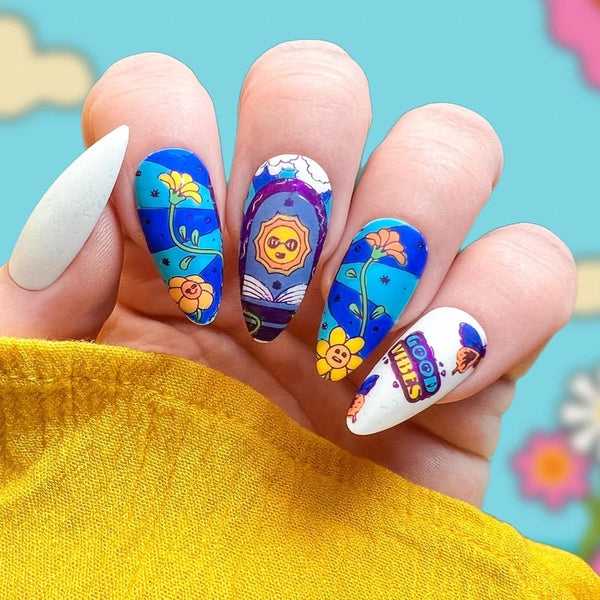 bright blue floral nail art designs from maniology pressed flowers