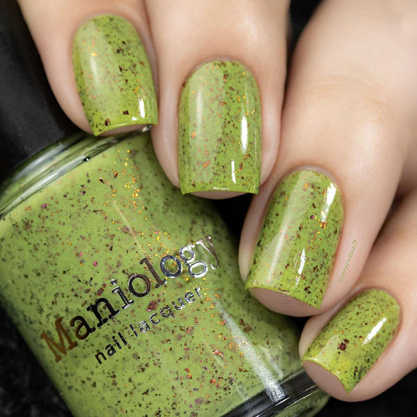 green nail polish with glitters