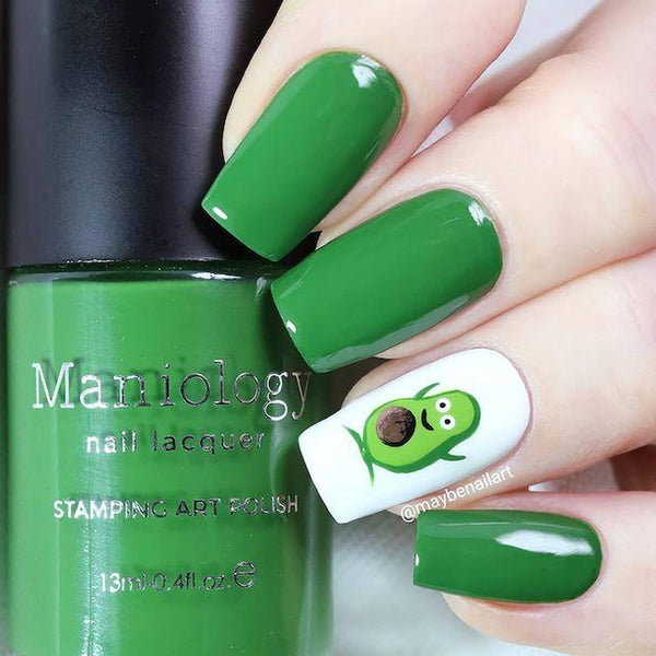 green nails with an avocado on it