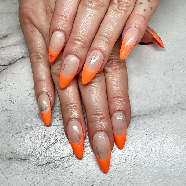 hands with orange tips french manicure nails nails nail art bright orange makeup sponge nails nail artists nails nails