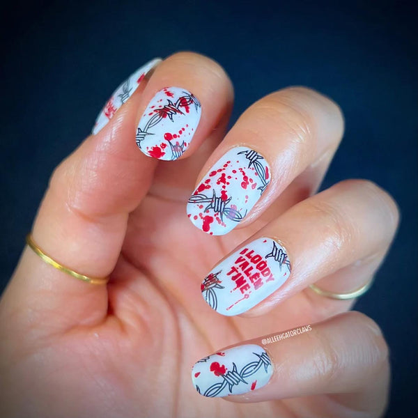 hearts and thorns nail stamping plate from maniology french tips different shade classic red day nails