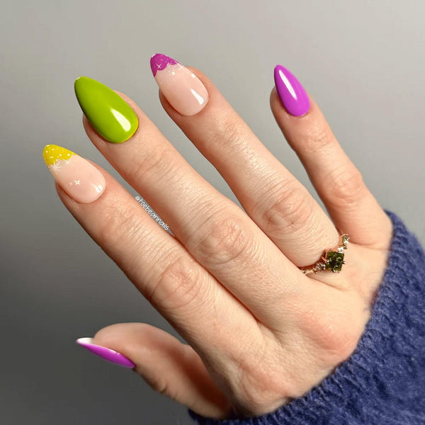 manicure with green and purple nail art