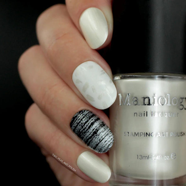 manicure with metallic white nail polish from maniology acrylic nails gifts gifts