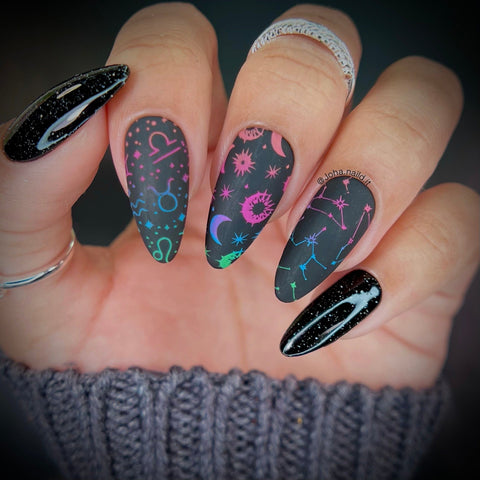 Astrological Star Signs on Neon Colors over a black matte base - Astrology Nails and Tarot Nails: 10 Mystical Nail Designs for Halloween