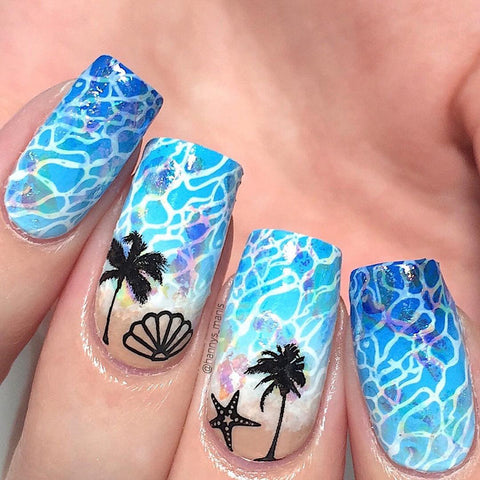 Beachy wave manicure by @hannys_manis using a Maniology mermaid stamping plate