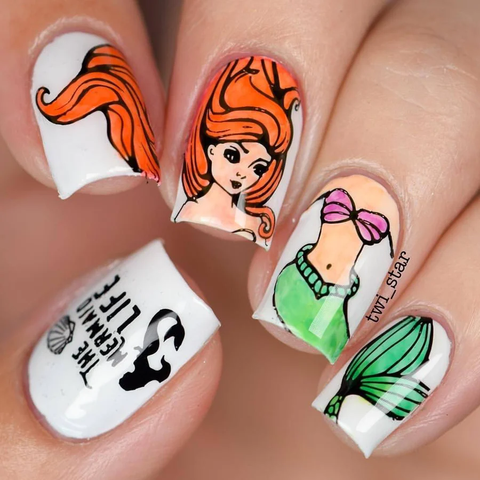 Little Mermaid nails with Ariel inspired designs