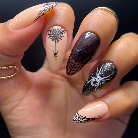 Black and nude spider web manicure for Halloween