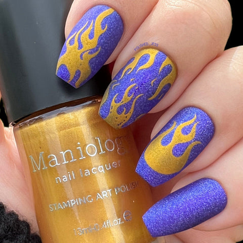 Purple flame nails by @polished_jess using a Maniology flame stamping plate