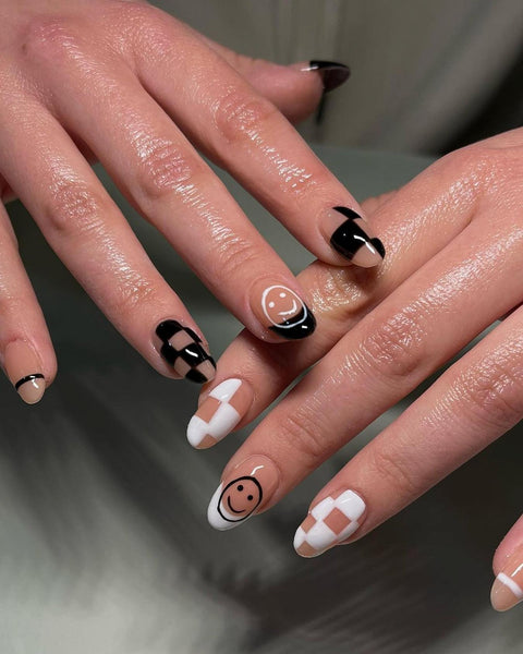 nail art with black and white designs