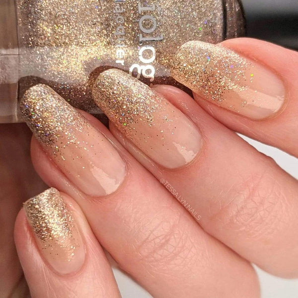nails with gold glitter polish new years eve nails manicure gold silver glitter tips nails nude base clean lines