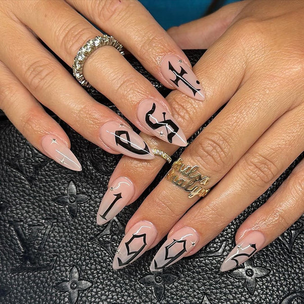 nude nails with black designs negative space one nail artist wear steady hand own nails app