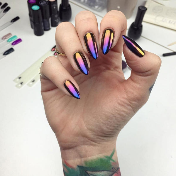 girl with tattooed wrist and purple metallic nail polish pink gray worn halloween shades manicure manicure dark skeletons combination combination fans play length crosses rhinestones dramatic nail goth nails nail