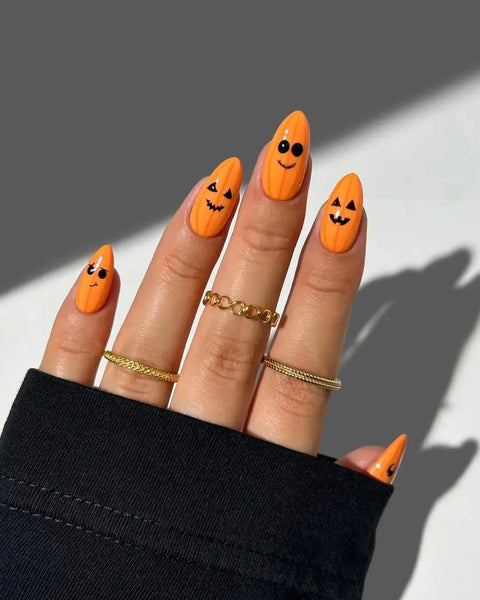 pumpkin nails that are smiling pumpkin nail design image love white image white pumpkin nail design pumpkin nail pumpkin nails pumpkin nail design pumpkins halloween nail nails nails nails nails