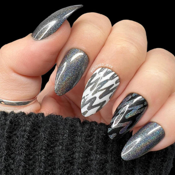 someone's hand with gray glittery nail art white accents date night quick tutorial nude cool dots wear fingers nude post black nail designs silver create nude tip manicure black nail designs black nails black nails