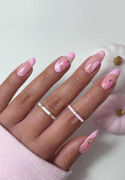 someone's hand with pink nail art fall ideas fall ideas orange pumpkin nail design matte fall orange fall fall nails halloween nails fall orange fall orange fall orange nails pumpkins