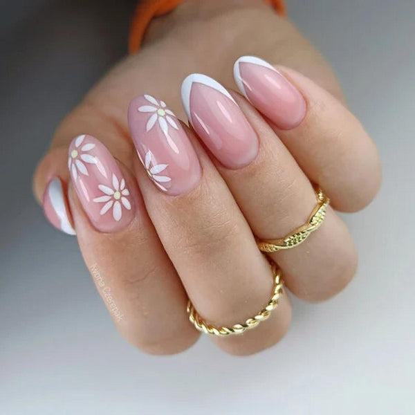 someone's hands with white and pink nail art designs nudes instagram classic nudes elegant glitter