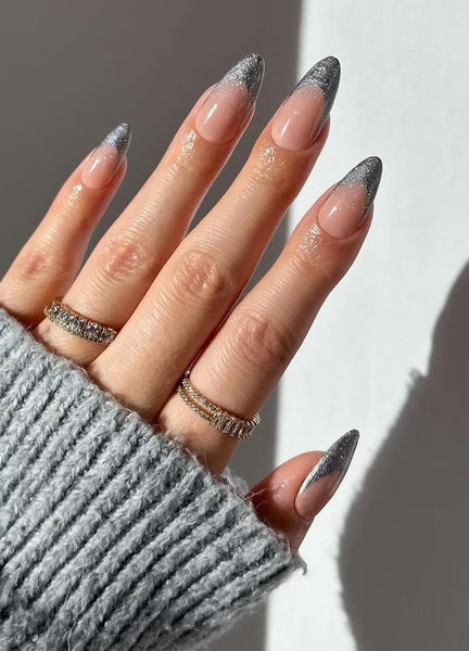 someone's nails with glitter silver designs silver nail art ideas silver nail silver nail designs ring silver nail designs