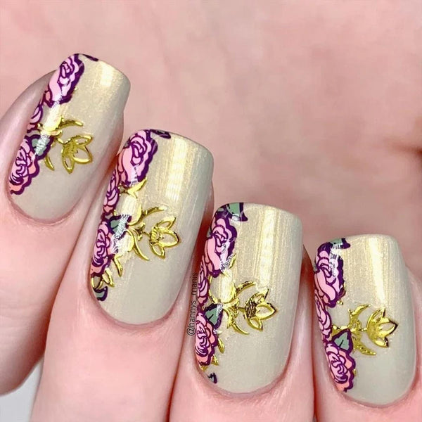 someone's nails with gold and pink nail design tips nails french tips years nails french tip white polish artistic look