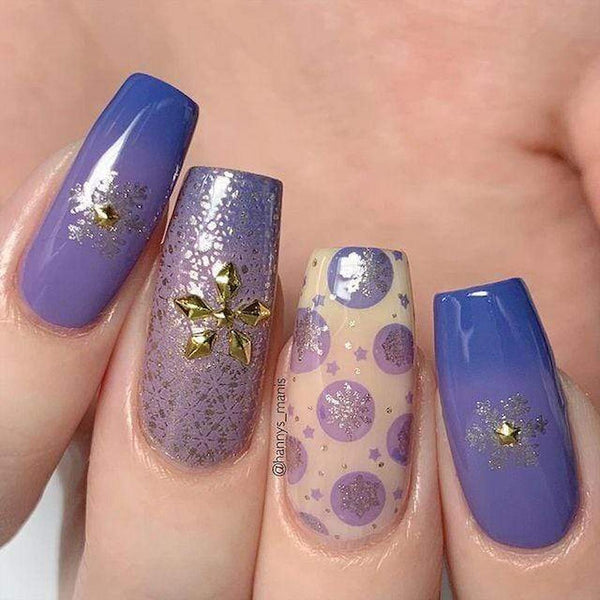 someone's nails with purple and gold designs french tip manicure gold silver glitter tips nails gold silver
