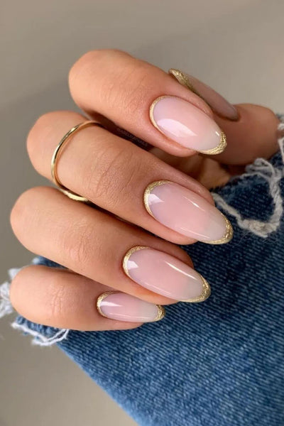 someone's natural nails with gold details on the edges nails classy nail design nails square nails glossy finish white dots