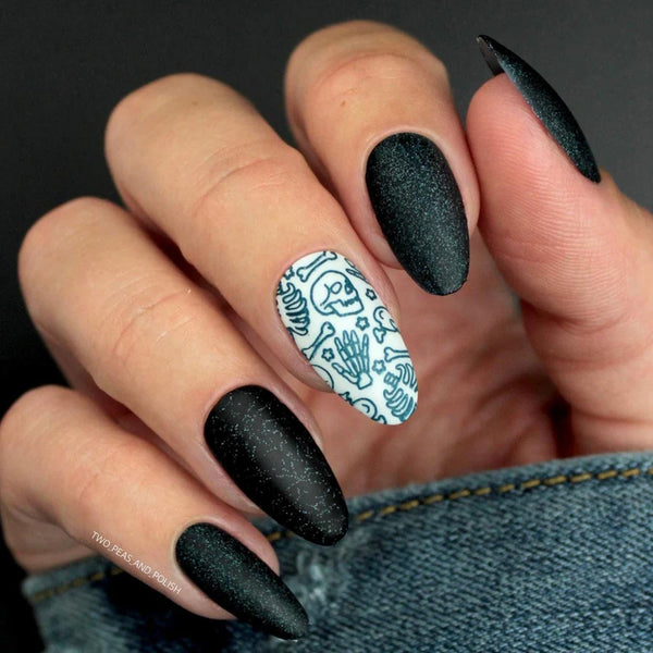 someones nails with dark sparkly polish black cat nail designs deep purple french tip halloween nails halloween nails