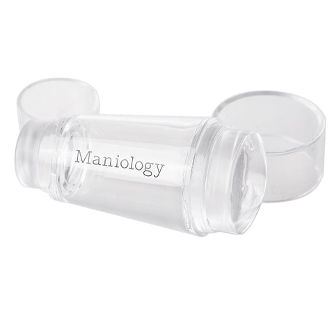 A clear silicone stamping heads that comes in 2 sizes: 0.9 in. and 0.6 in. in diameter and also has clear caps on both ends